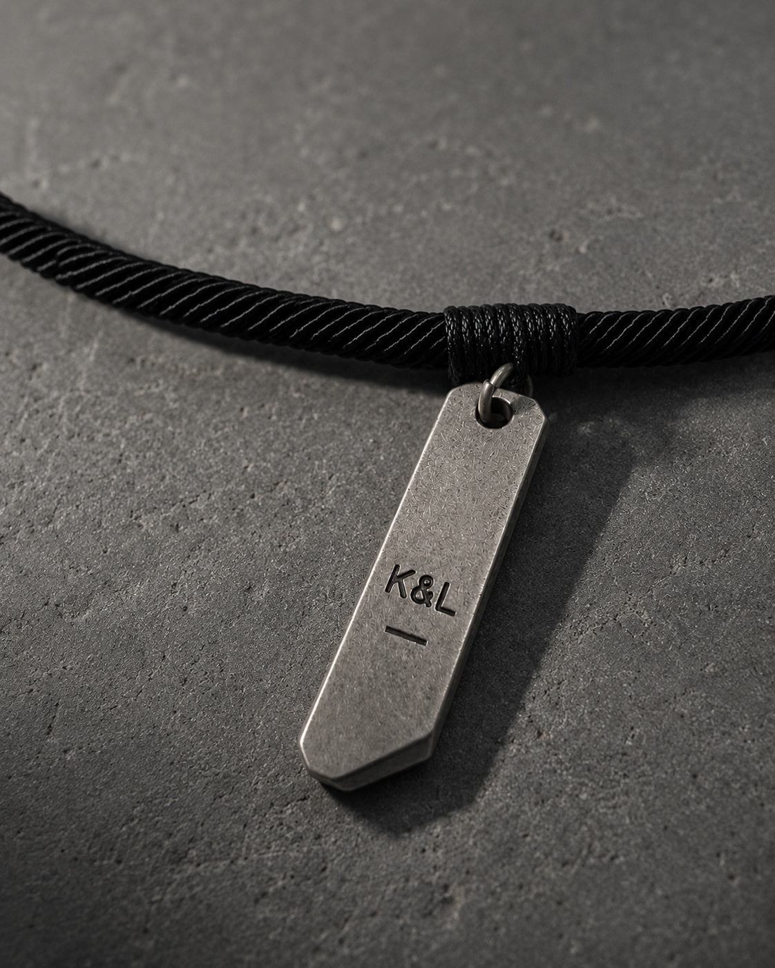Hand-bound K and L archive tag surface detail